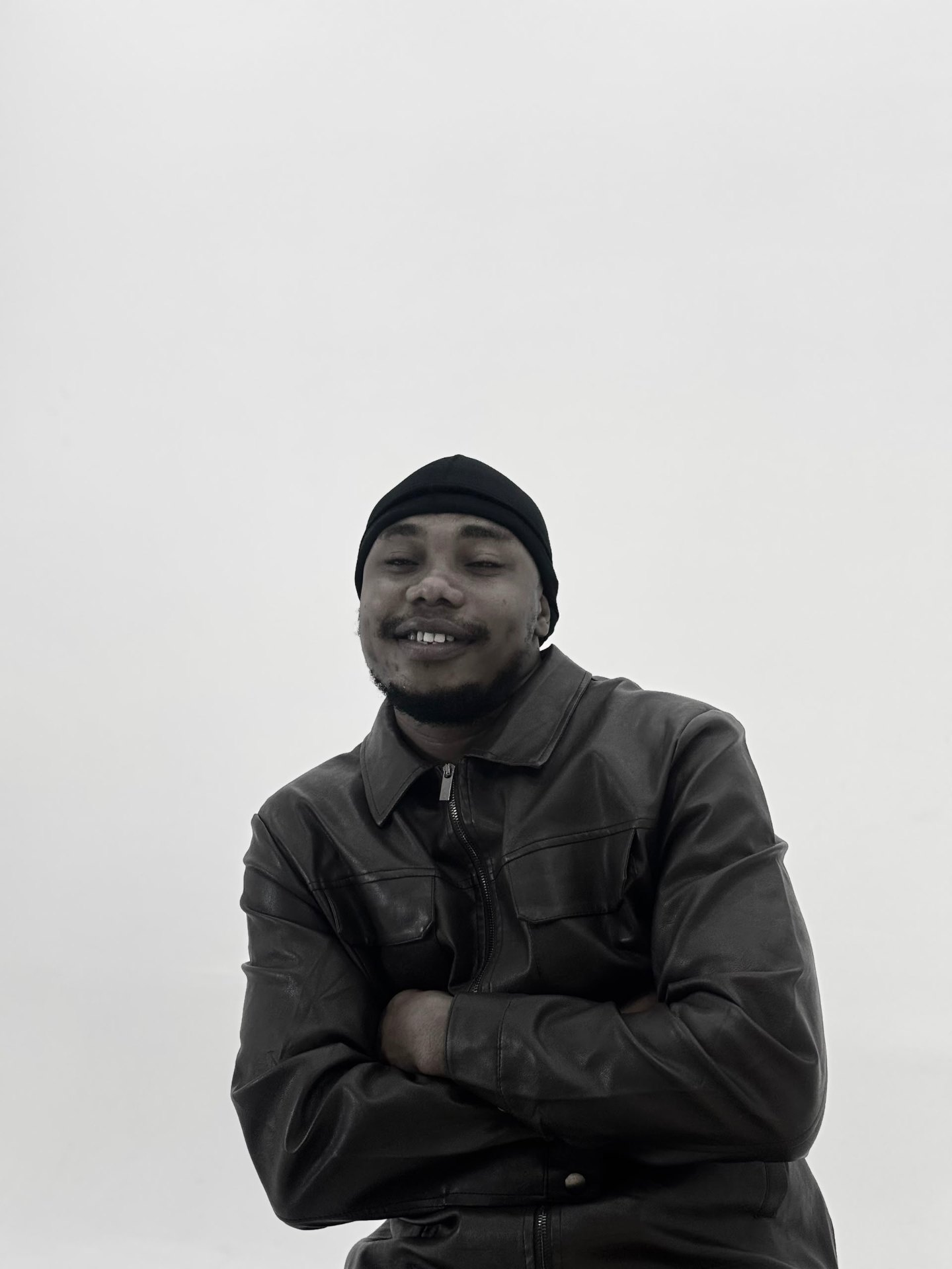 H3RITAGE in a black leather jacket — official editorial studio portrait
