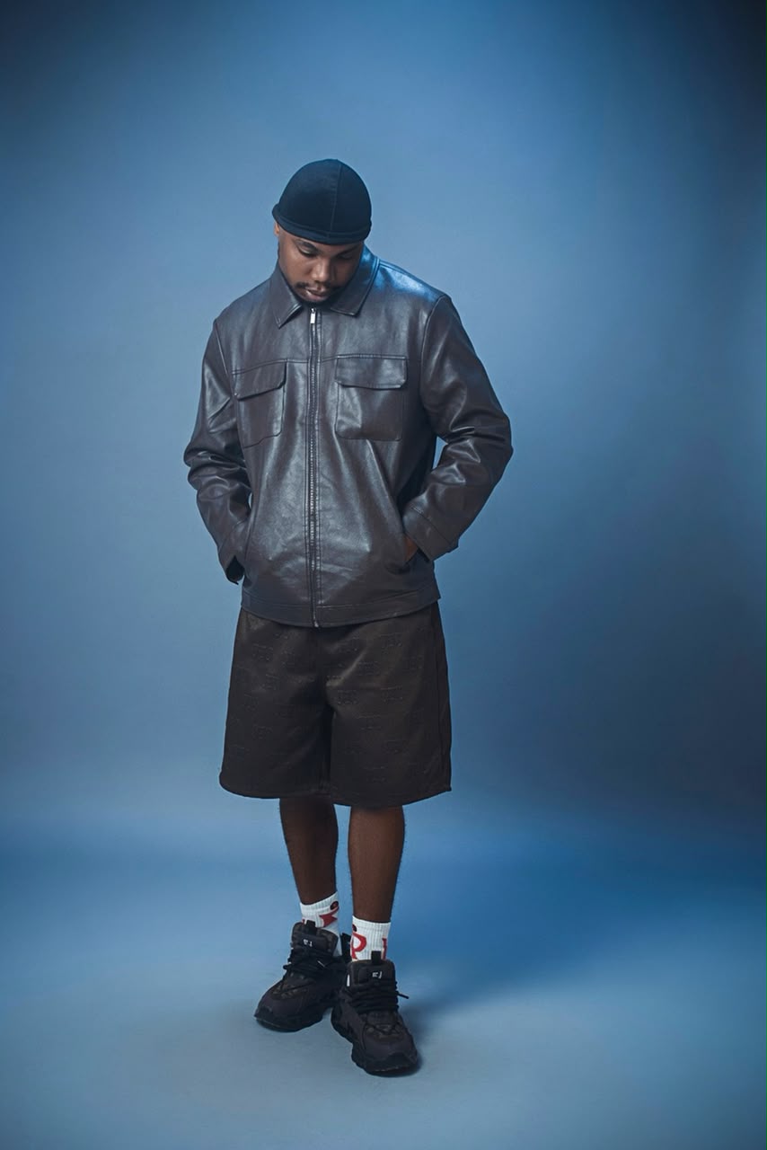 H3RITAGE full-length studio portrait in a black leather jacket — official promotional photograph