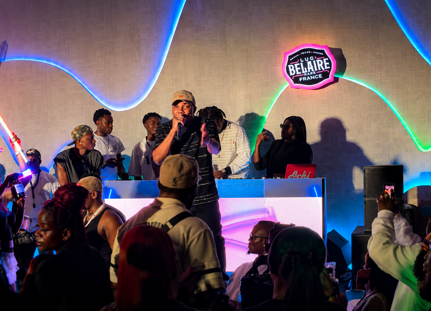 H3RITAGE on stage alongside the DJ during a live performance